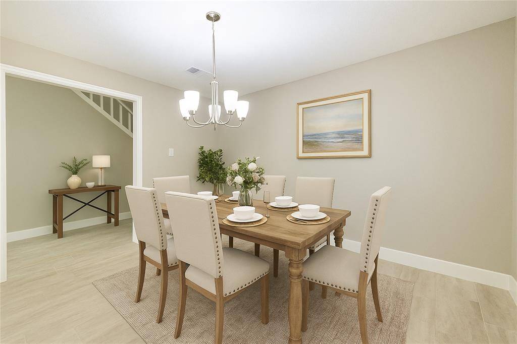 Virtually staged dinning room.