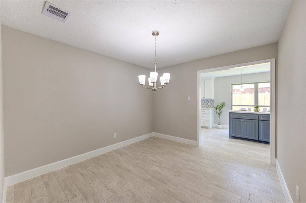 Another view of the dinning room that opens up to the kitchen area.