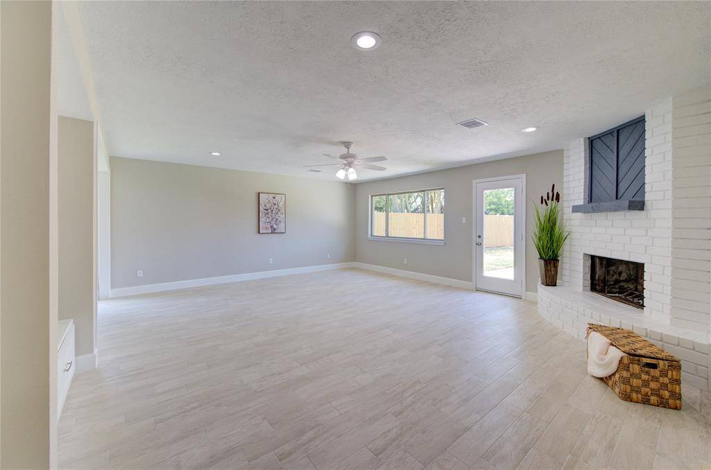 The living room offers comfort and relaxation where you can imagine your furniture in a variety of configurations.