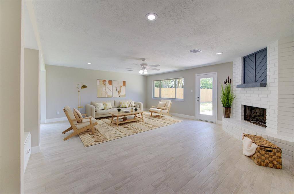 Virtually staged living room. Regardless of how you design this space, you'll have the open atmosphere with plenty of design opportunities.