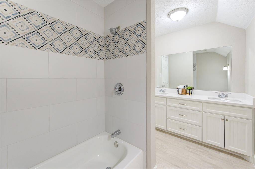 Another view of the guest bath.  Check out the stylish tile design!