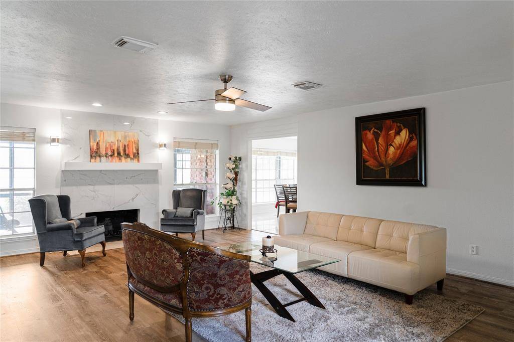 Spacious living room, perfect for entertaining guests and enjoying quality time with family.