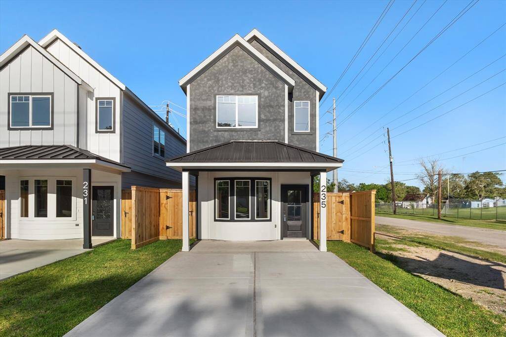 This place has a great covered front porch, durable stucco siding, a medal roof accent and an extensive double wide driveway, long enough for 6 vehicles to comfortably park.