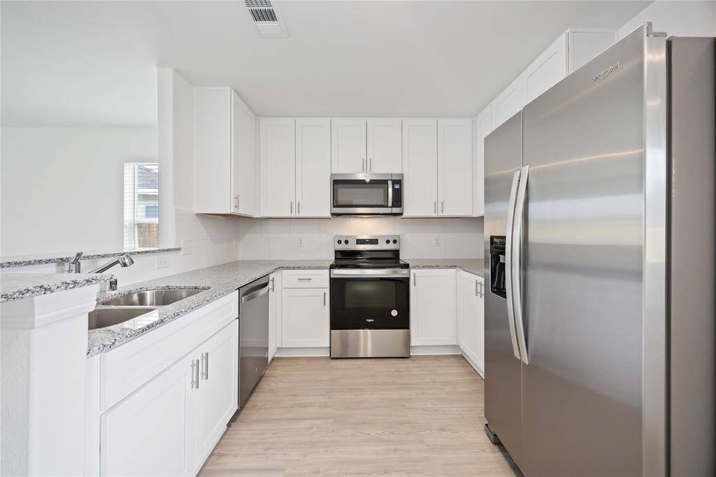 Kitchen with all new appliances and Refrigerator included.