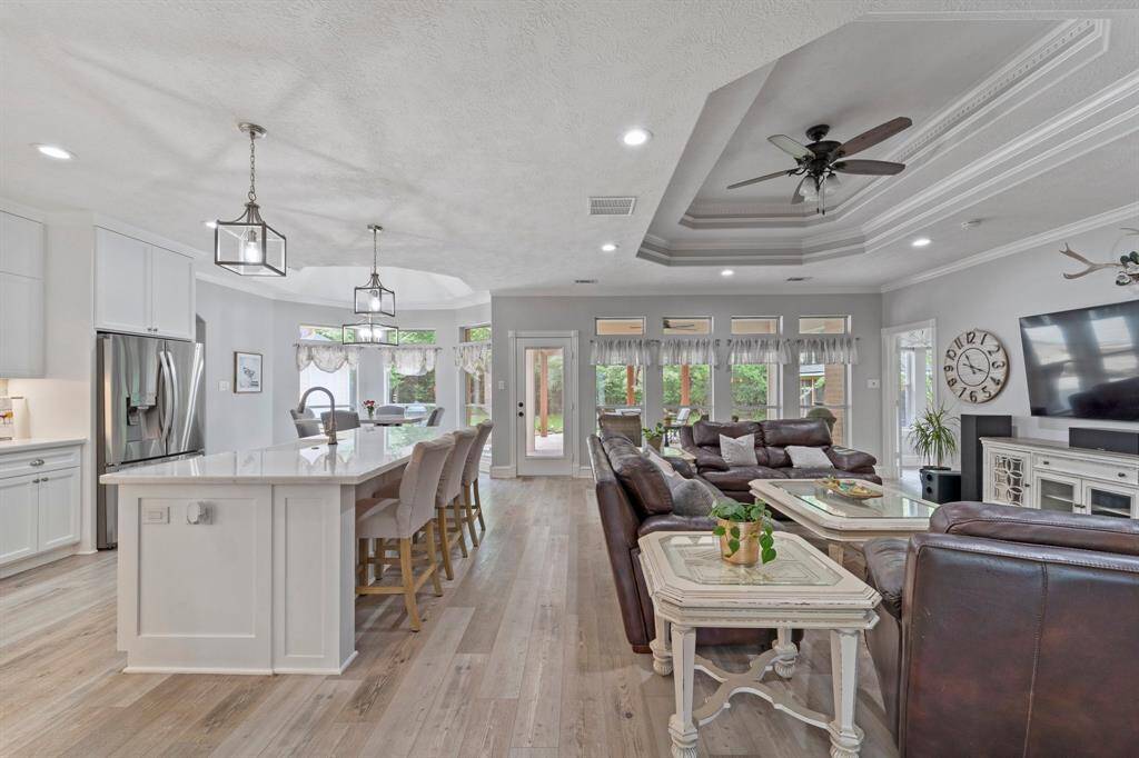 The front foyer leads you into the main living spaces with the kitchen / breakfast / family room combo.