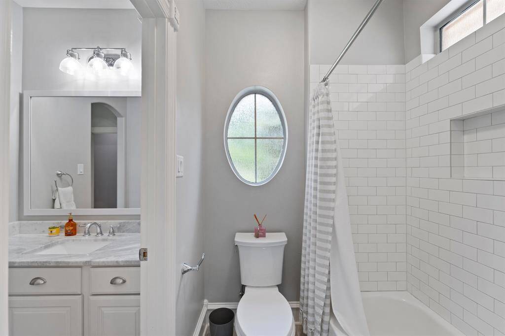 One of the sinks connected to the tub/shower in second full bath.