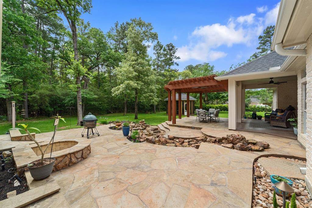 So many areas to relax and gather in the backyard with your family and friends.