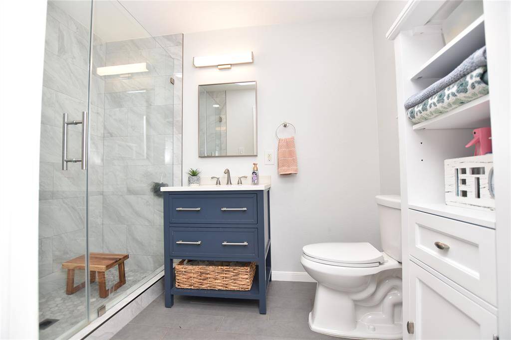 The private ensuite bath offers a peaceful escape, with thoughtful finishes and ample space to unwind.