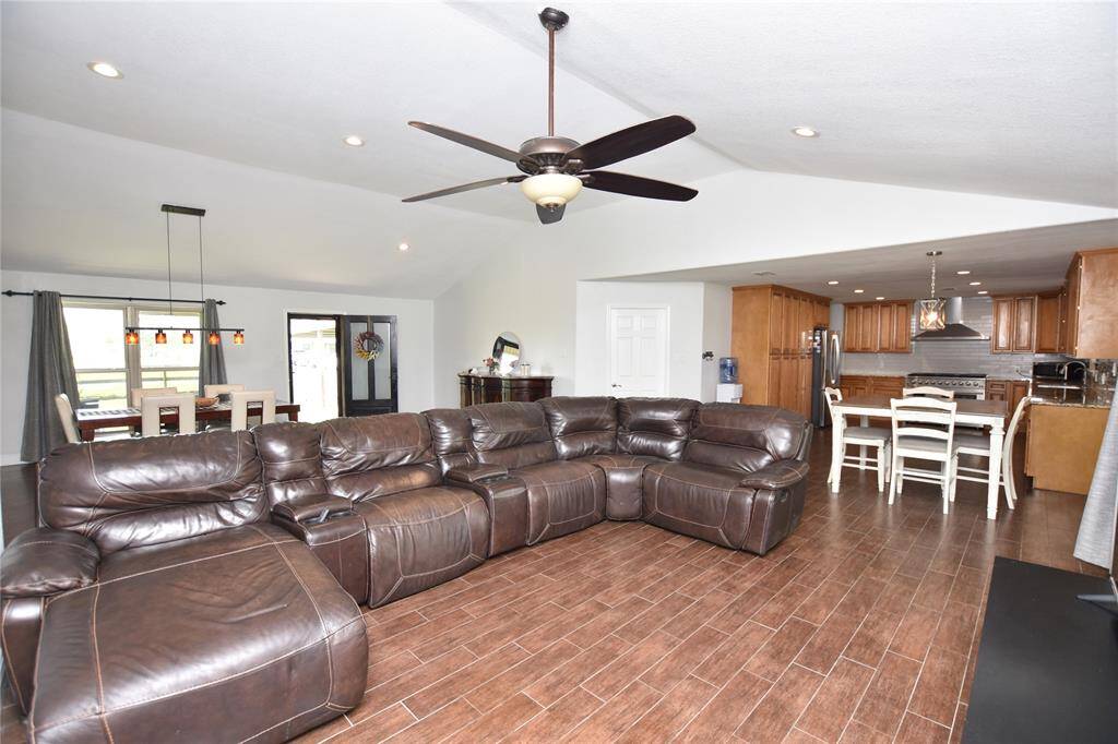 Upon entering, you're greeted by an open-concept layout that immediately feels spacious and inviting.