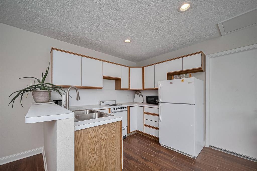Attached studio apartment kitchenet.