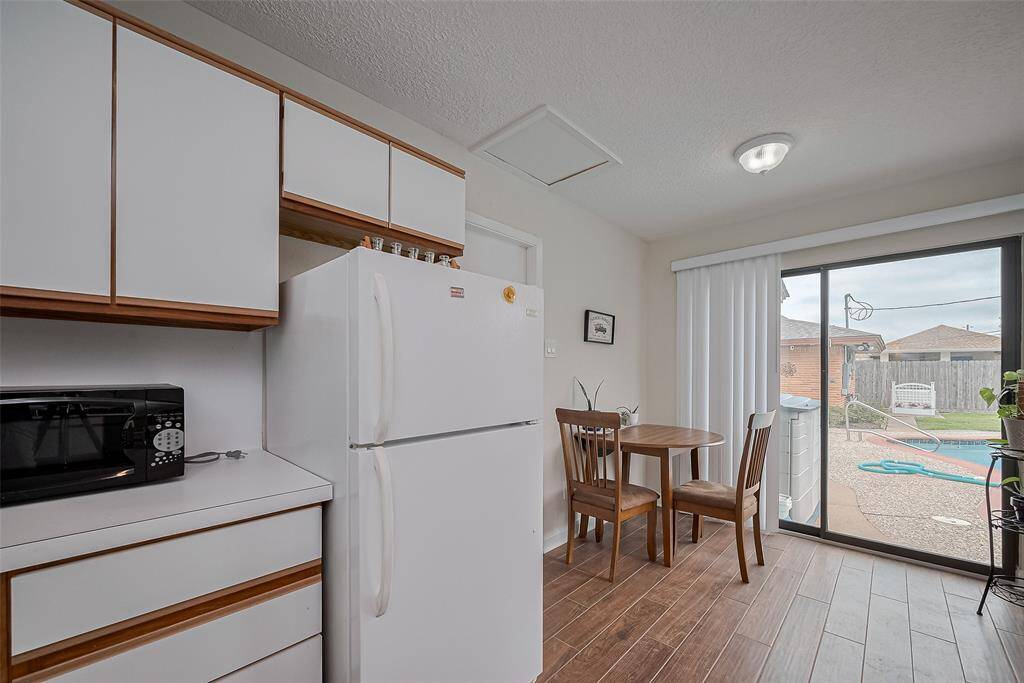 Attached studio apartment kitchenet will pool access.