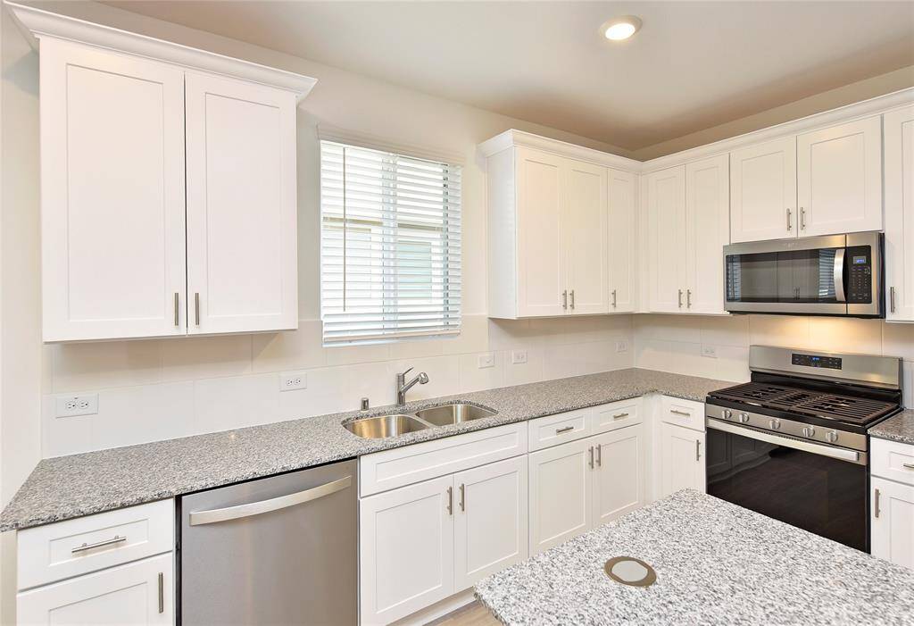 Enjoy brand new stainless steel appliances—including a dishwasher, microwave, refrigerator, and gas range. You'll also love the pantry closet and abundant cabinet storage!