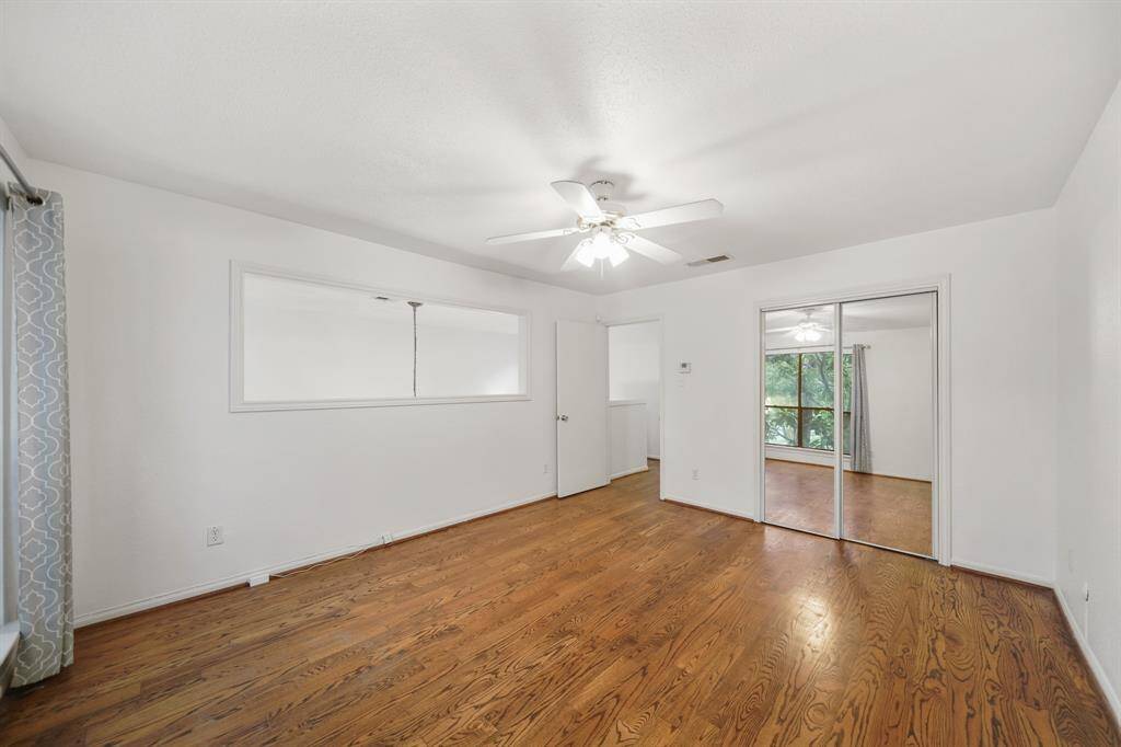 The second bedroom upstairs offers an open lofty feel and also ideal for a home office.