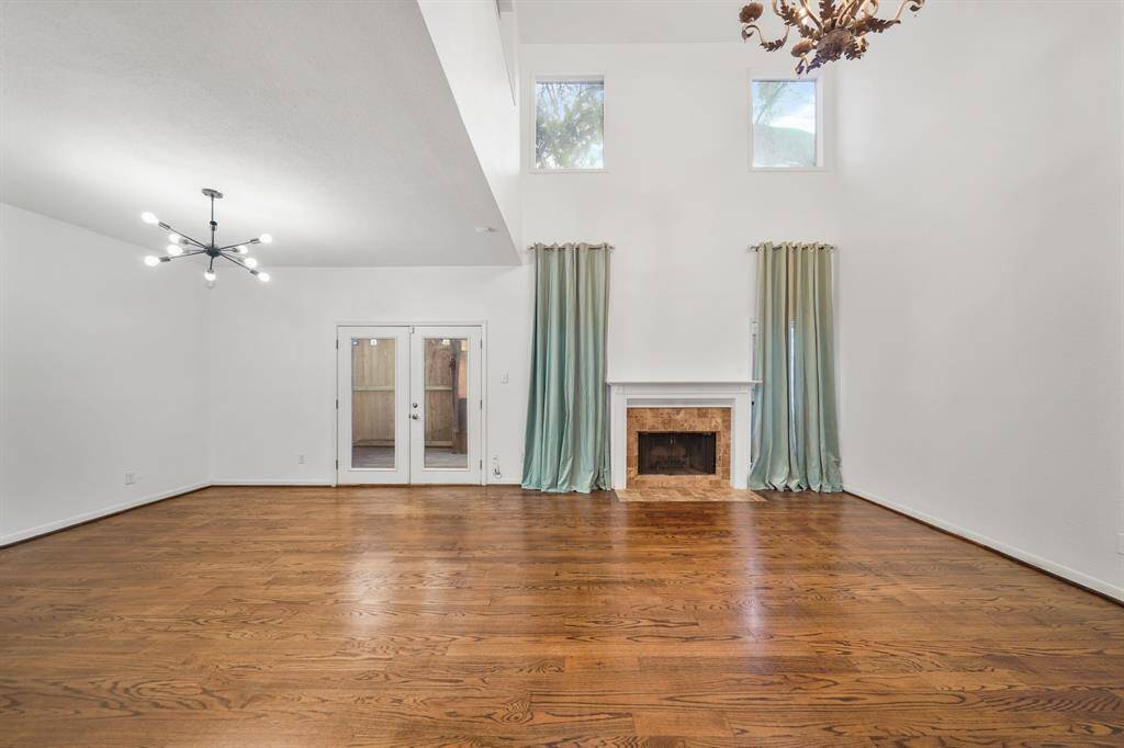 The open floor plan offers flexibility for personalized furniture arrangement.