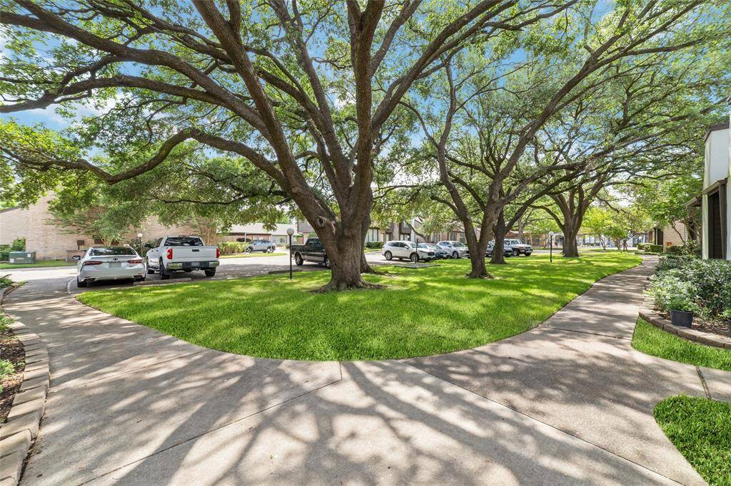 This well-maintained, lush complex feels like an oasis, with vibrant landscaping and thriving plants that create a serene retreat. The meticulous care given to the grounds enhances the peaceful atmosphere, offering a perfect escape from the everyday.