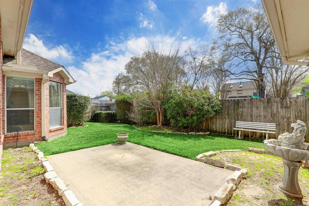 OUTSIDE YOU HAVE A NICE PATIO FOR DINING AND ENTERTAINING.