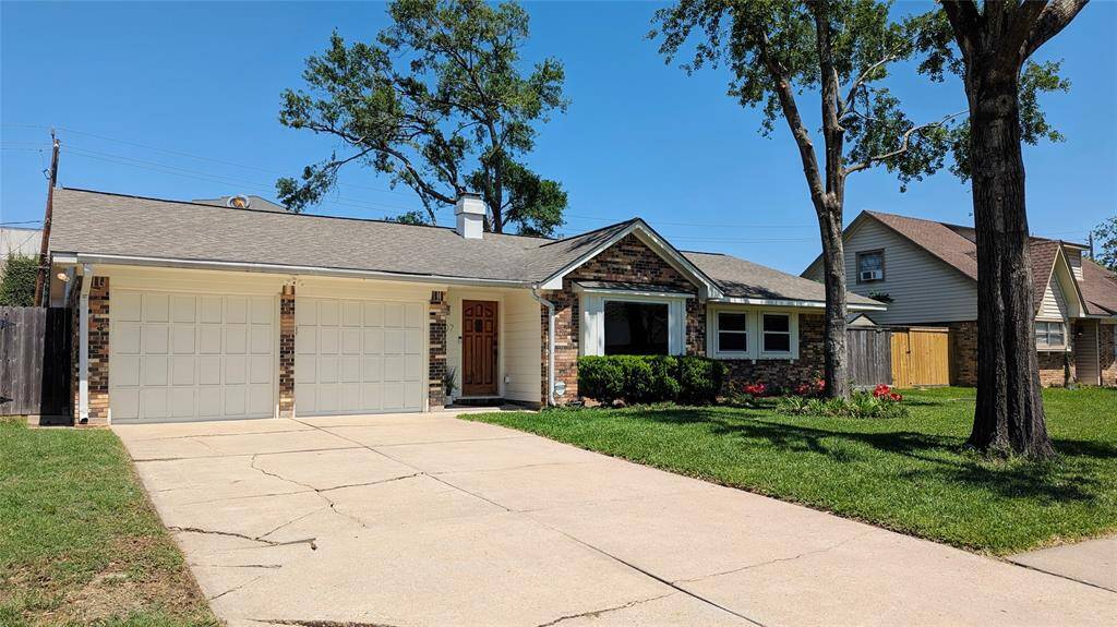 Front of house and 2 car garage