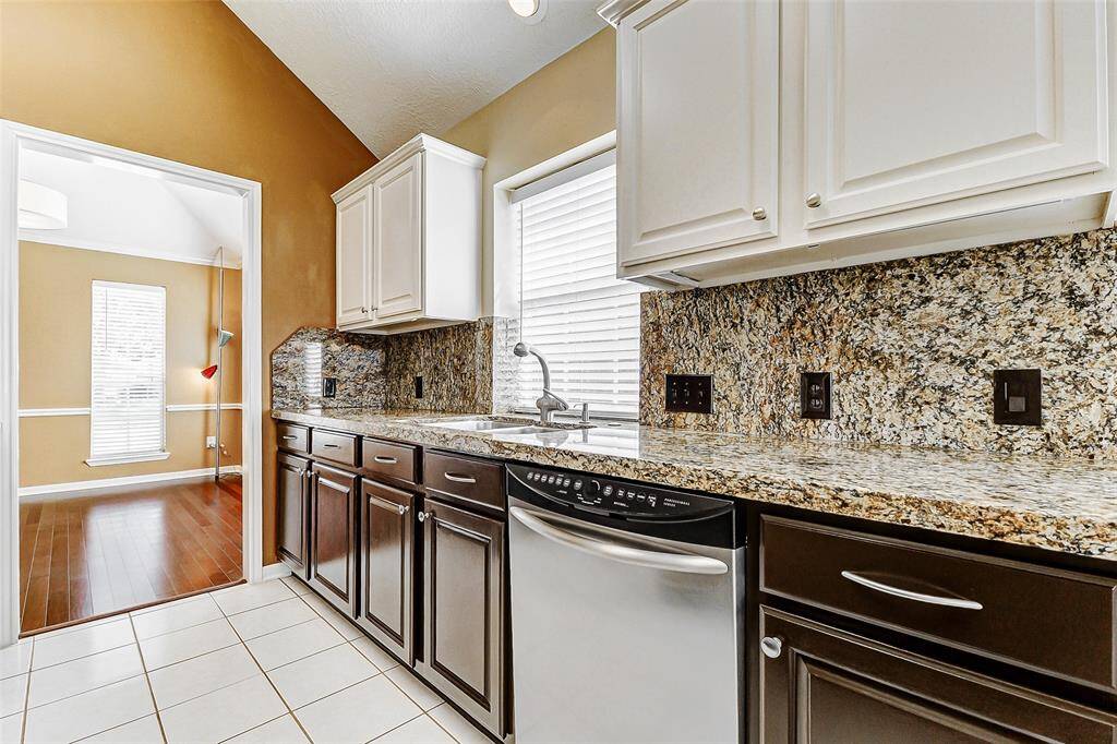 Experience the subtle yet impactful glow of under-cabinet lighting, thoughtfully installed beneath some upper cabinets to enhance both ambiance and task lighting throughout the kitchen.