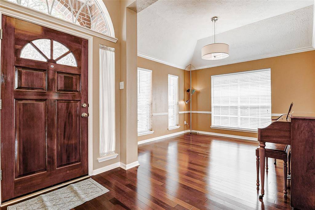 The large flexible space by the front door adapts to your vision. Use it as an open study or an elegant dining room, the choice is yours.