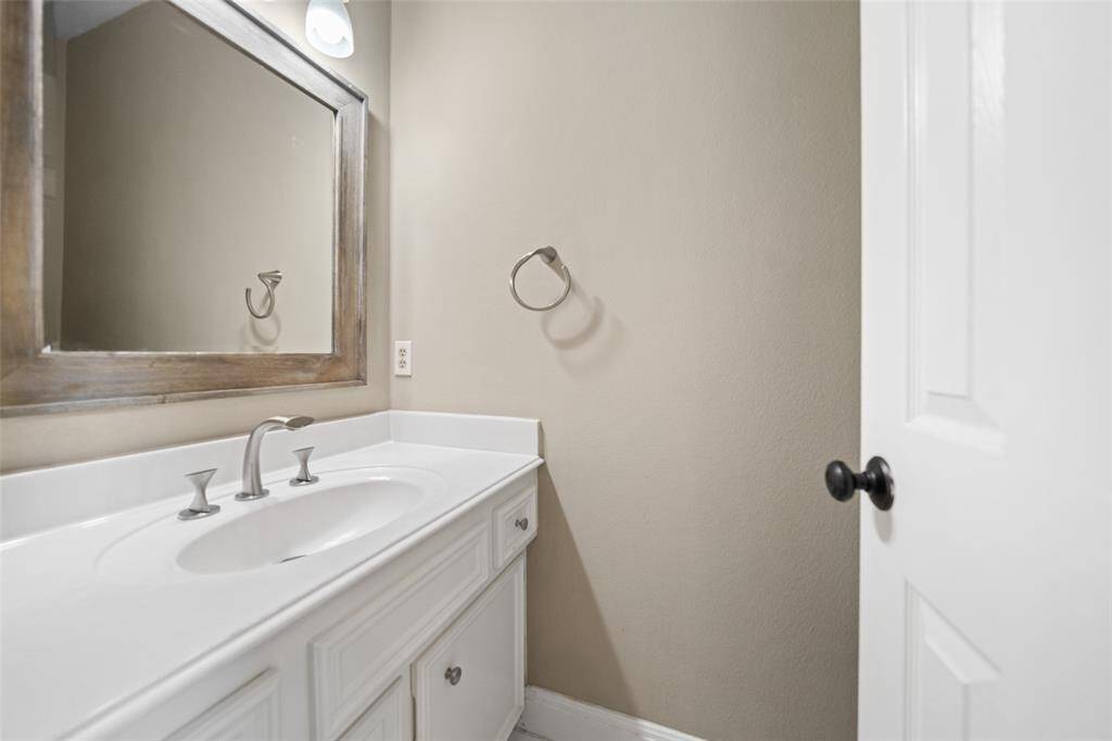 Half bath is also located on the first floor near the large family room.