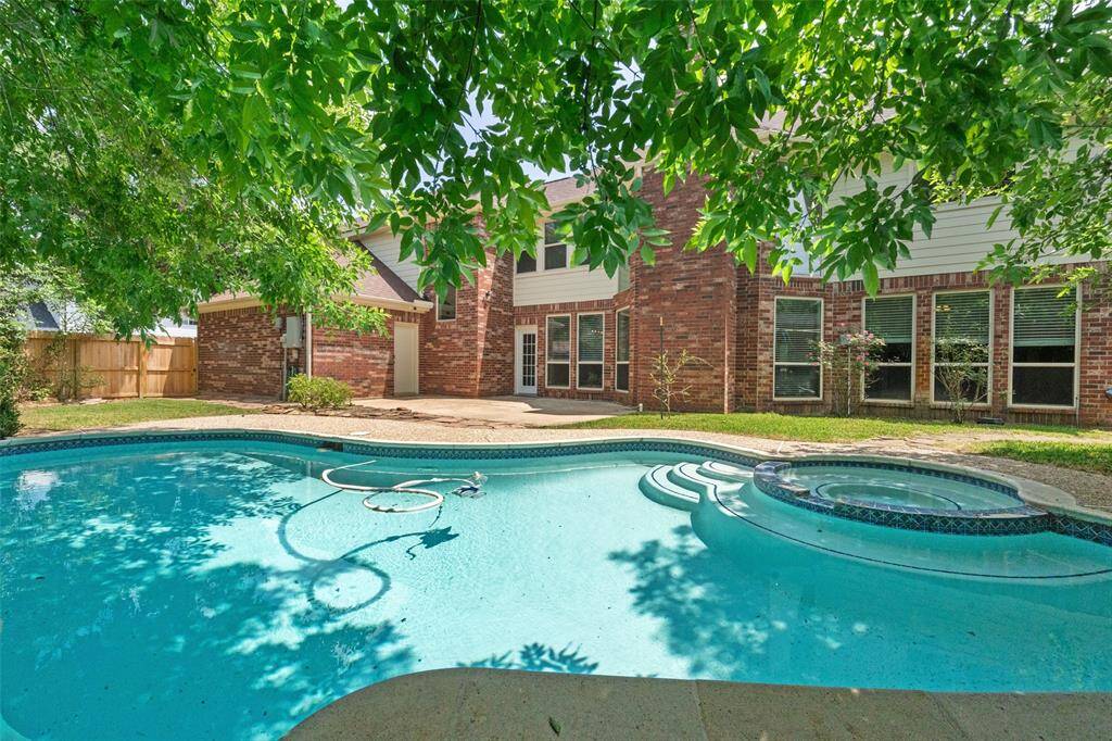 Perfectly sized pool with hot tub.