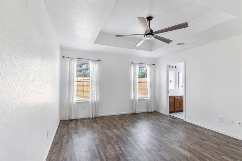 THIS IS YOUR PRETTY PRIMARY SUITE WITH YOUR ATTACHED PRIMARY BATH.  SELLERS TOOK SO MUCH PRIDE AND MAKING SURE EVERYTHING WAS ALWAYS CLEAN AND SHINY.