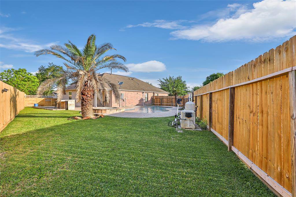 YOU WILL HAVE THE NICEST YARD IN THE SUBDIVION WITH LUSH GREEN GRASS.  PLENTY OF ROOM FOR A JUNGLE GYM/SWINGSET.