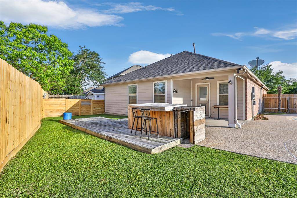 SELLER JUST INSTALLED NEW FENCE, COVERED PATIO, MINI FRIDGE  WITH BAR. THE SIDE YARD IS FENCED WITH A SHED