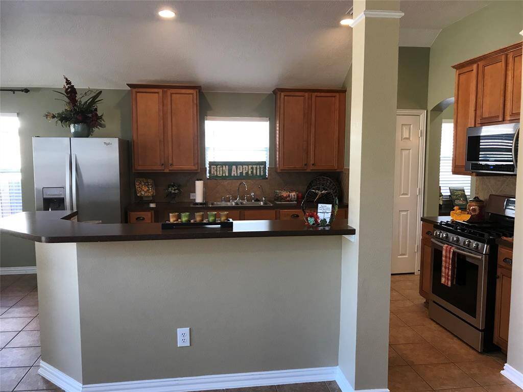 Open kitchen overlooking family room