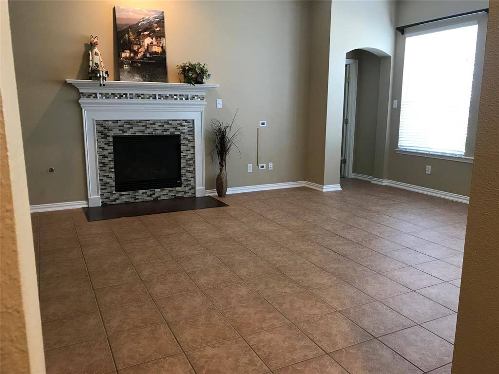 Open family room with remote fireplace
