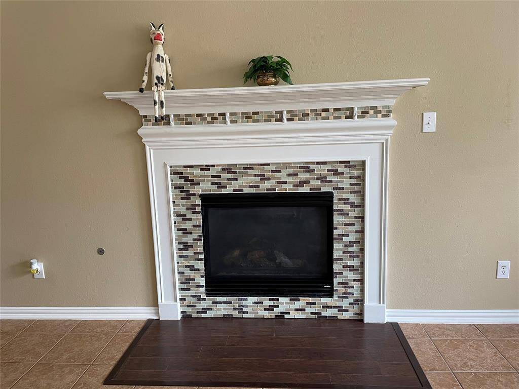 decorative fireplace with gas logs