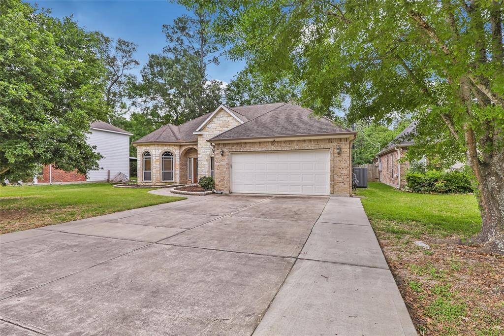 Spacious driveway for ample parking.