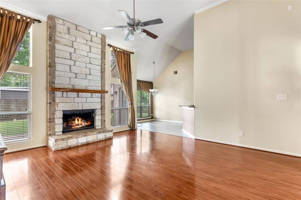 Cozy up by the inviting gas fireplace, perfect for creating a warm and welcoming atmosphere.