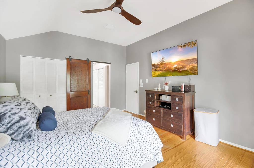 Primary Bedroom with a custom Barn door