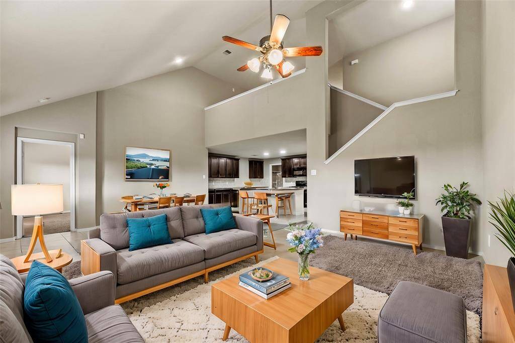 High or intricately designed ceilings can draw the eye upward, adding a sense of grandeur and elegance to the living room.