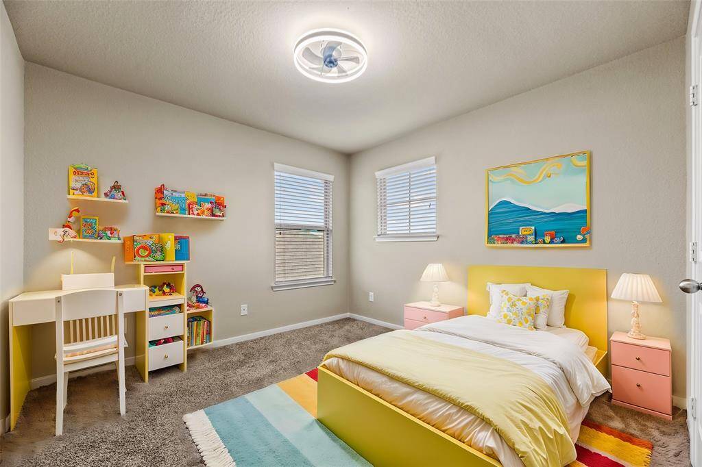 The thoughtfully designed layout of the third bedroom allows for natural light to flood the room, creating a warm and welcoming atmosphere.