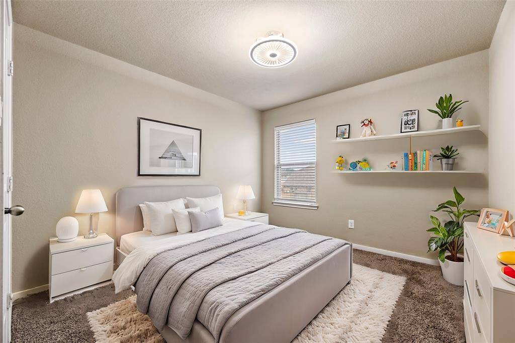With ample room to accommodate various arrangements, the fourth bedroom can serve as a perfect retreat for guests or family.