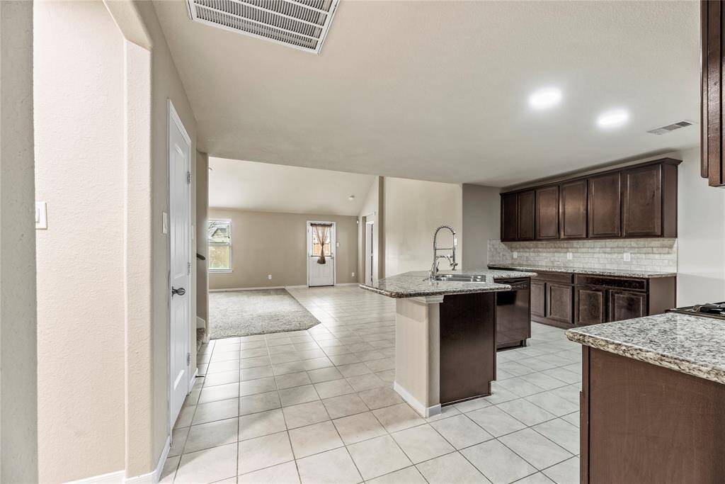The open floorplan keeps everyone together and makes the space feel huge.
