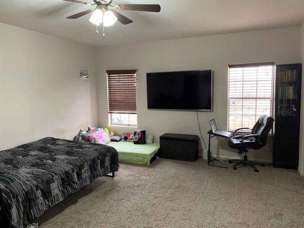 Includes space for a potential home office or seating area.