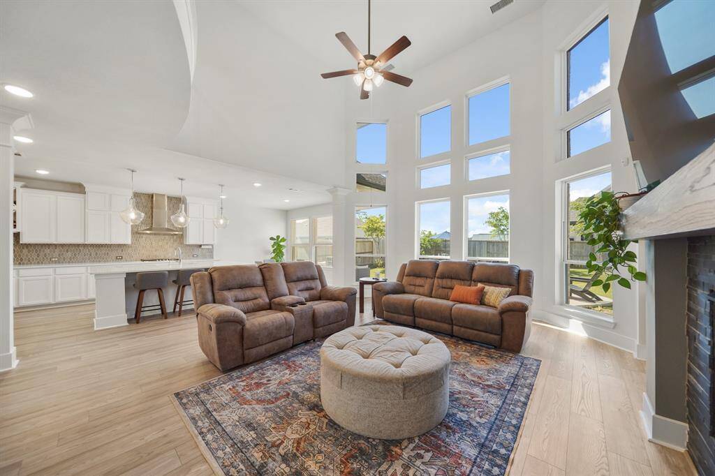 Expansive living area with a wall of windows for abundant natural light.