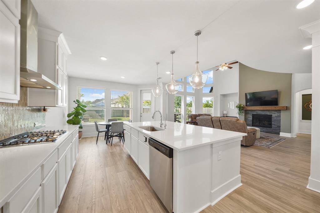 Chef’s kitchen with oversized island perfect for gathering and prepping.