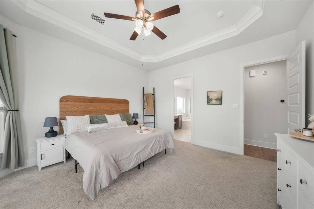 Primary suite detail showing comfort, style, and privacy.