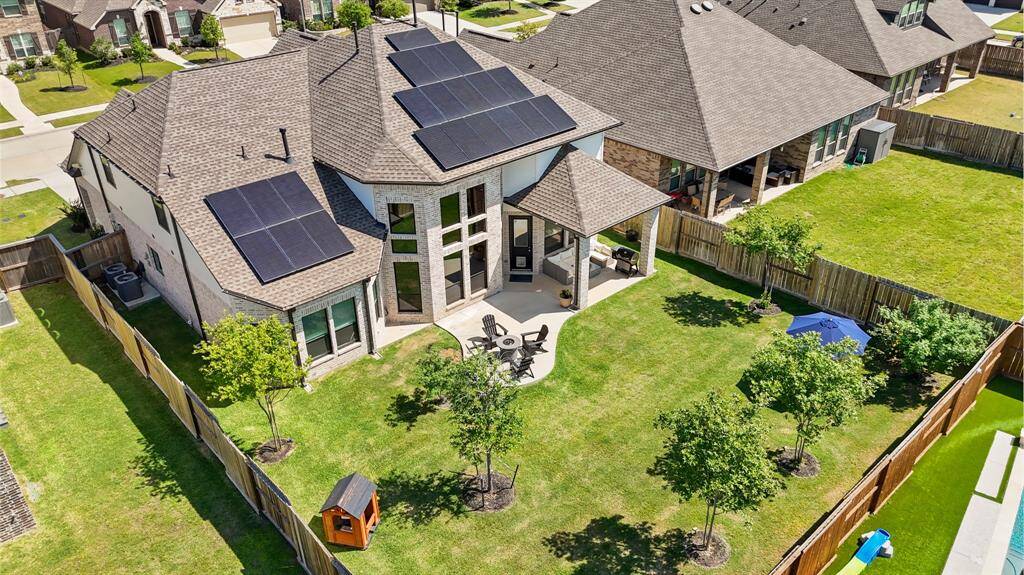 Drone shot highlighting the oversized backyard—perfect for future outdoor living spaces, a pool, or family gatherings.