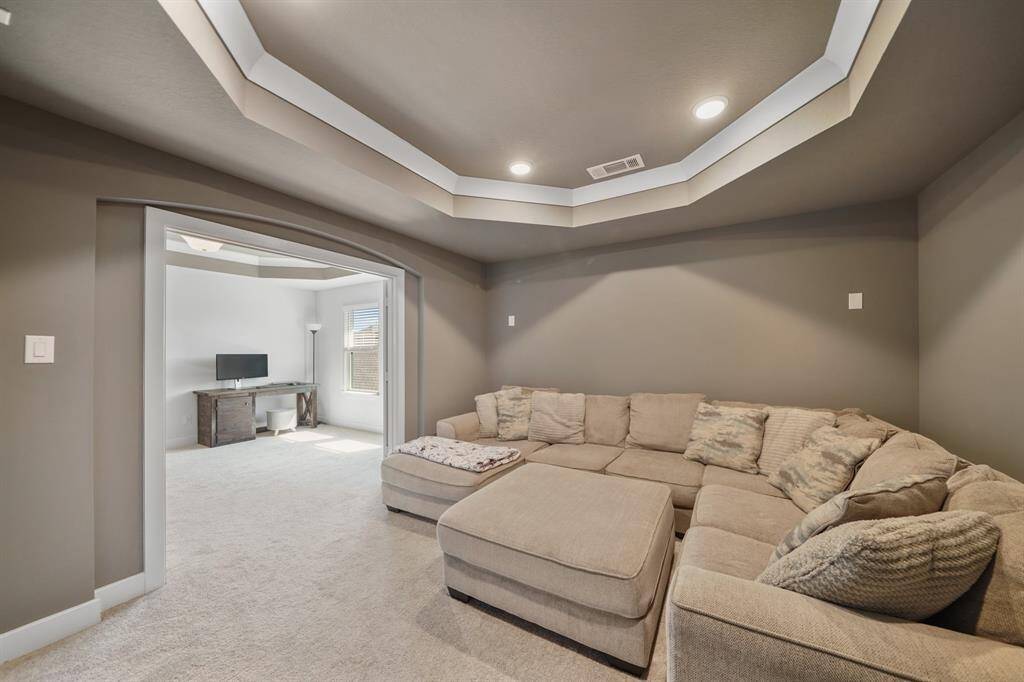 Spacious layout with room for oversized lounge seating, a large screen or projector, and full surround sound—your personal home theater awaits.