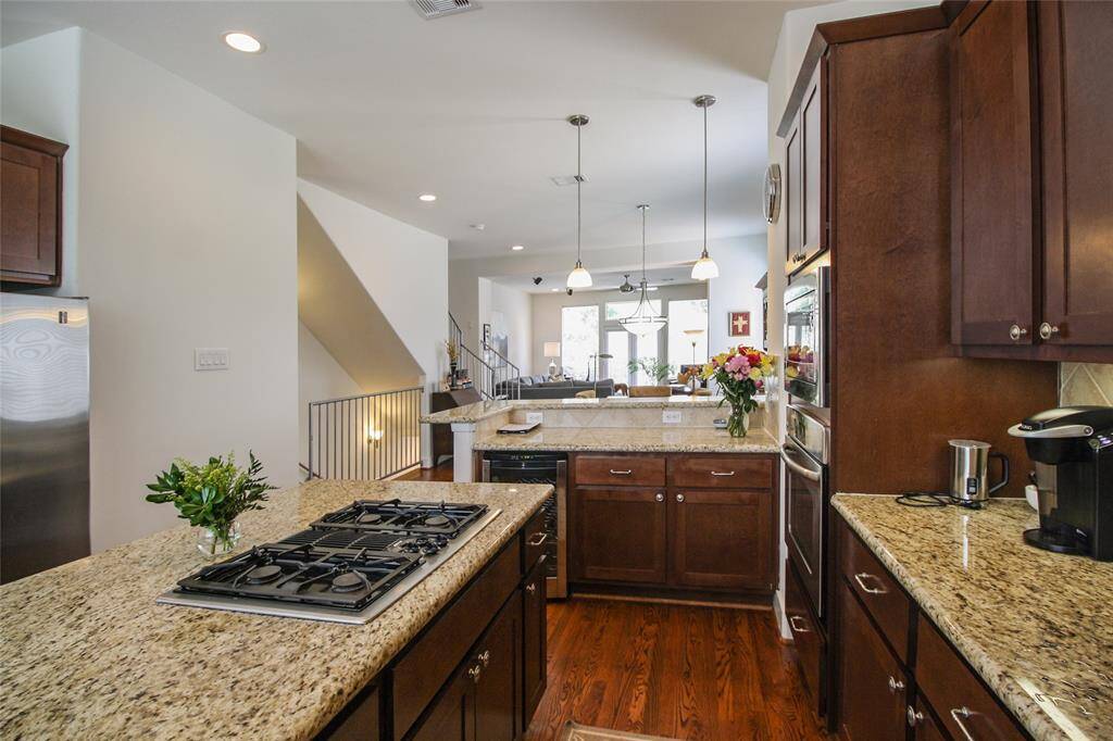So much storage! Endless cabinetry wraps this kitchen (Plus there is a huge walk-in pantry!)