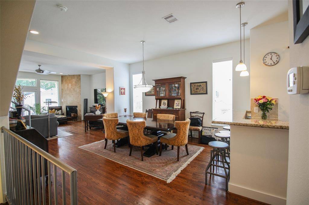 As you walk up the stairs to the second floor you will immediately notice an abundance of natural light and incredible open flow between the living, dining, & kitchen.