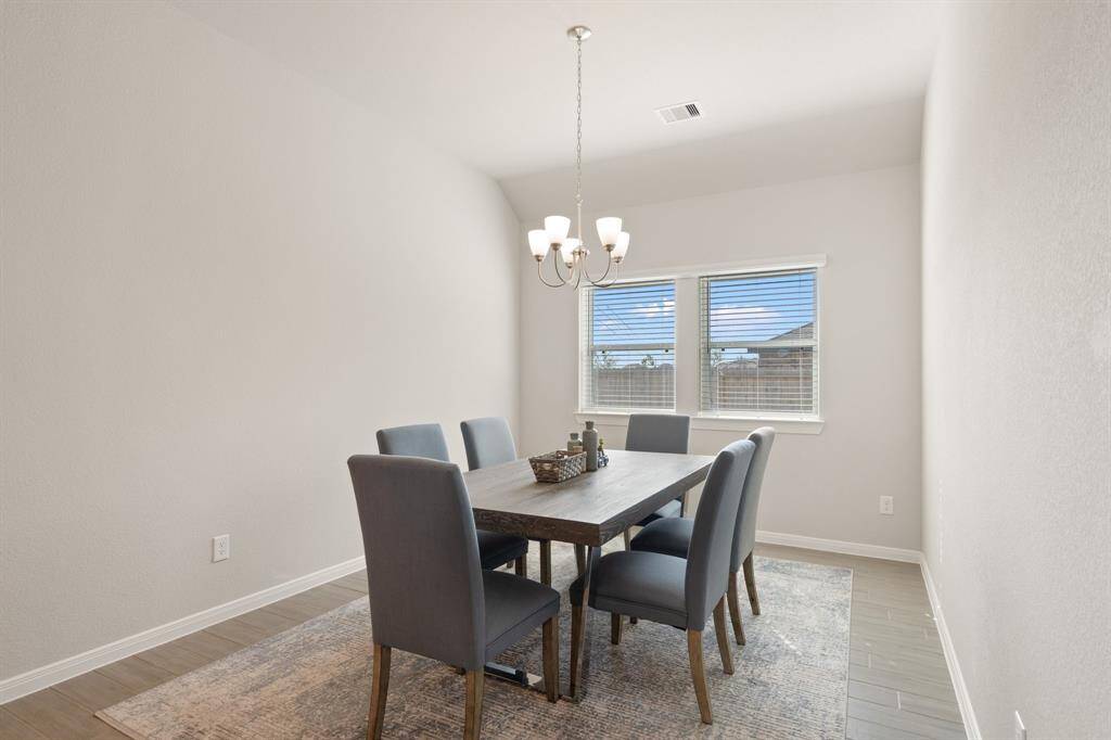 Directly across from the kitchen is the separate dining room.
