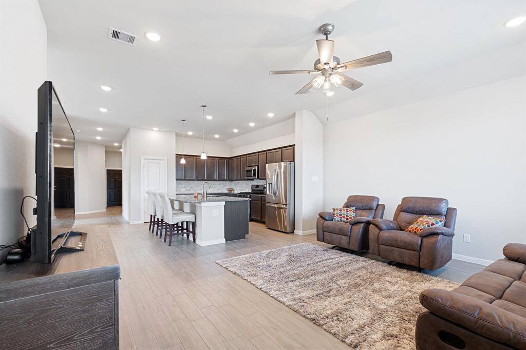 View from the backdoor of the family room and kitchen.
