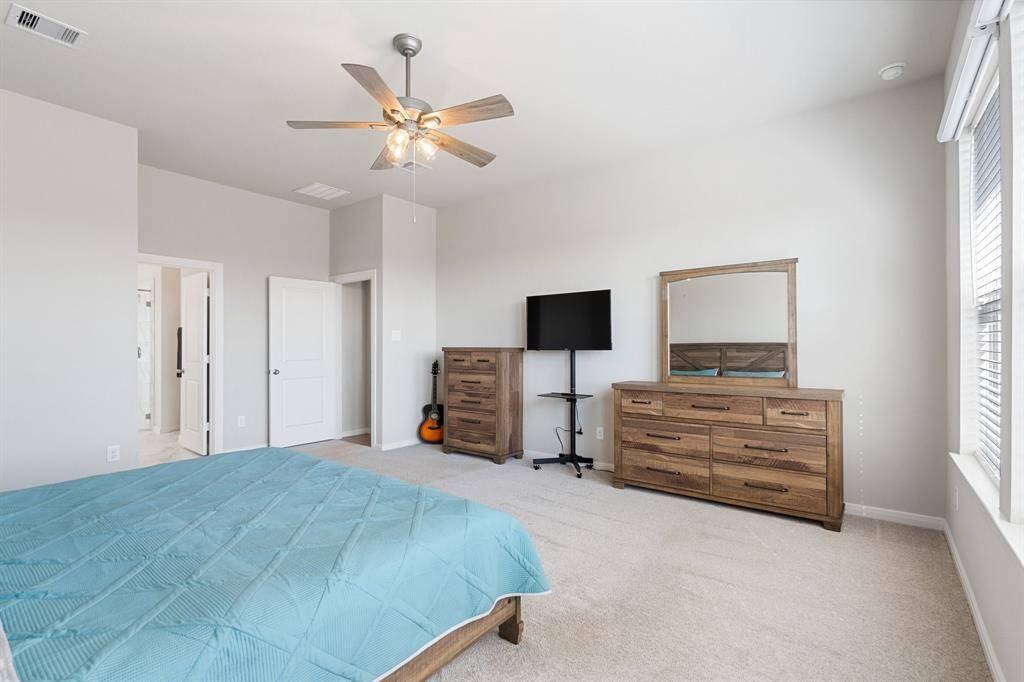 Off the family room is the access to this spacious Primary retreat.