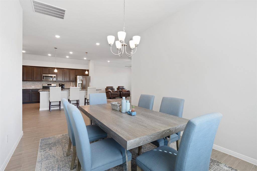 Separate dining room off the kitchen allows for family and friend gatherings for meals.